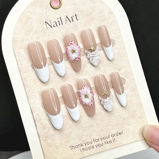 Hand-crafted three-dimensional flower shell textures press on nails